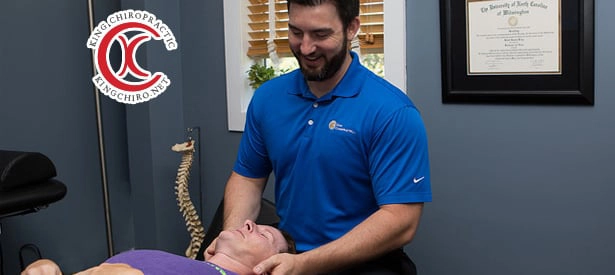 Chiropractor Wilmington NC Rhett King Adjusting Patient Neck Chiropractor Wilmington NC Rhett King Adjusting Patient Neck