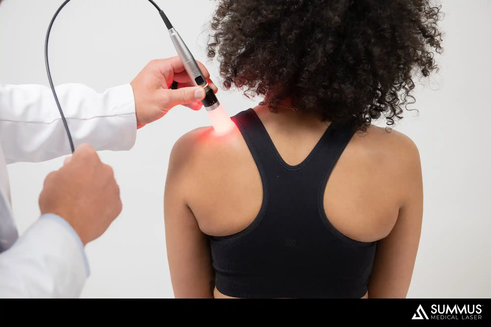 A person receiving laser therapy